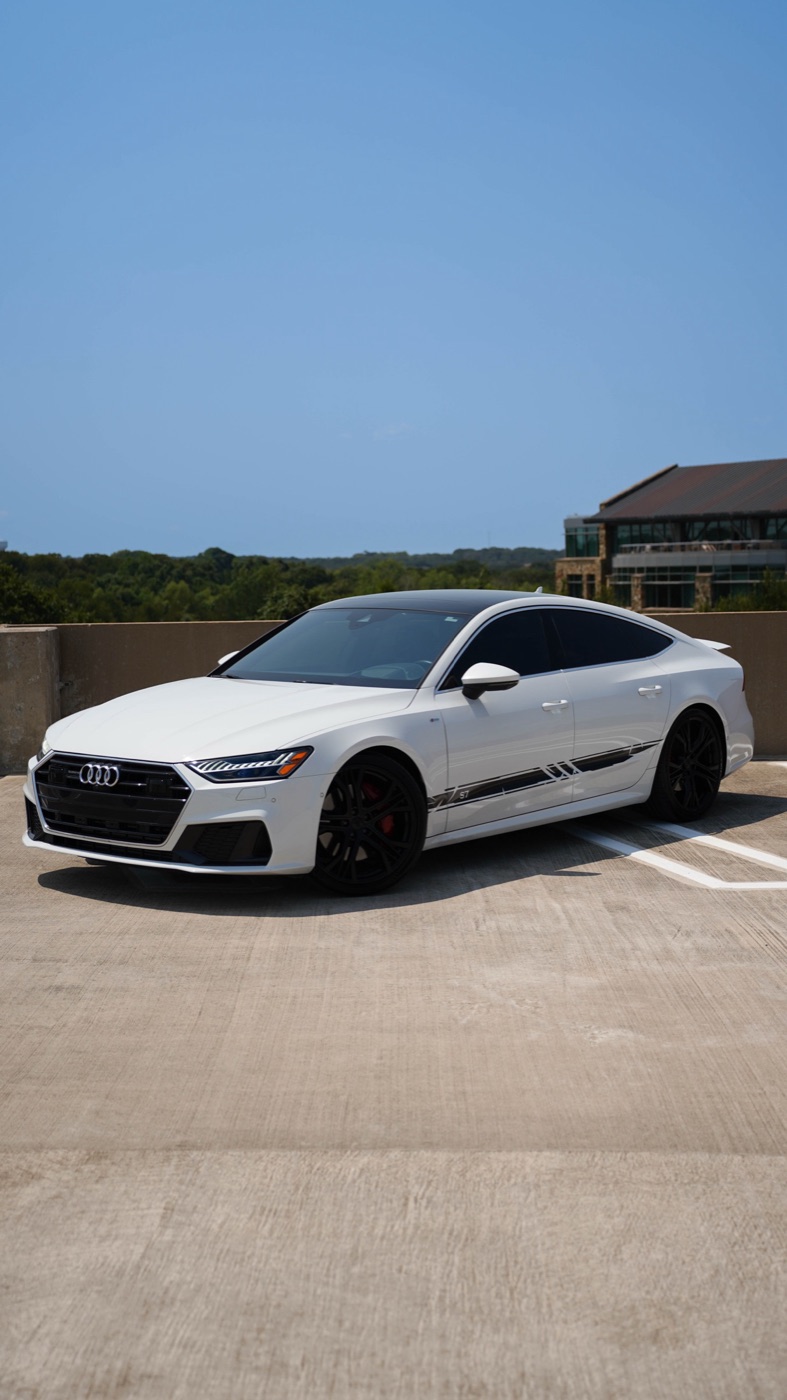 White Audi S7 luxury sportback available through Drivn Dallas