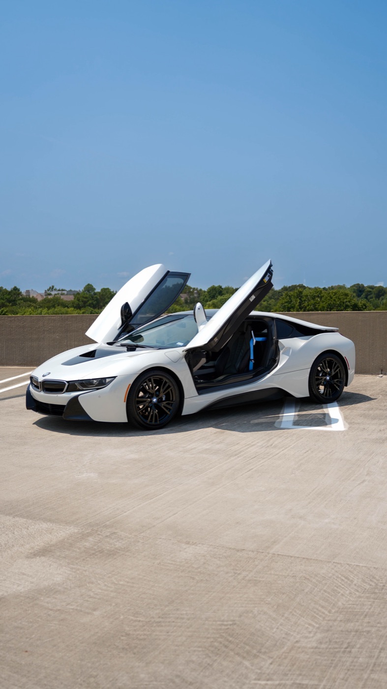 White BMW i8 available for self-drive exotic car rental in Dallas