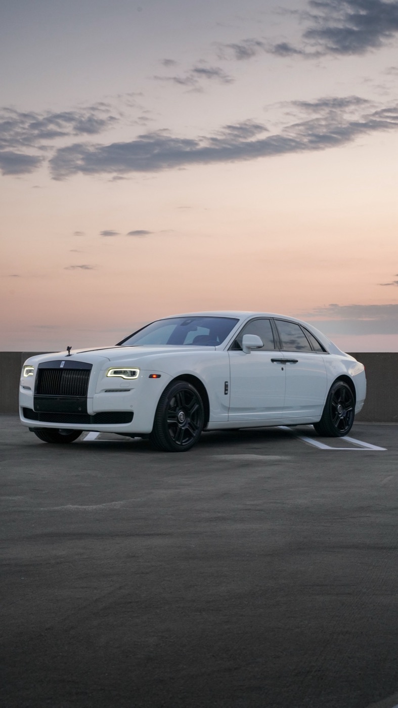 White Rolls-Royce Ghost available for luxury rental and chauffeur service in Dallas