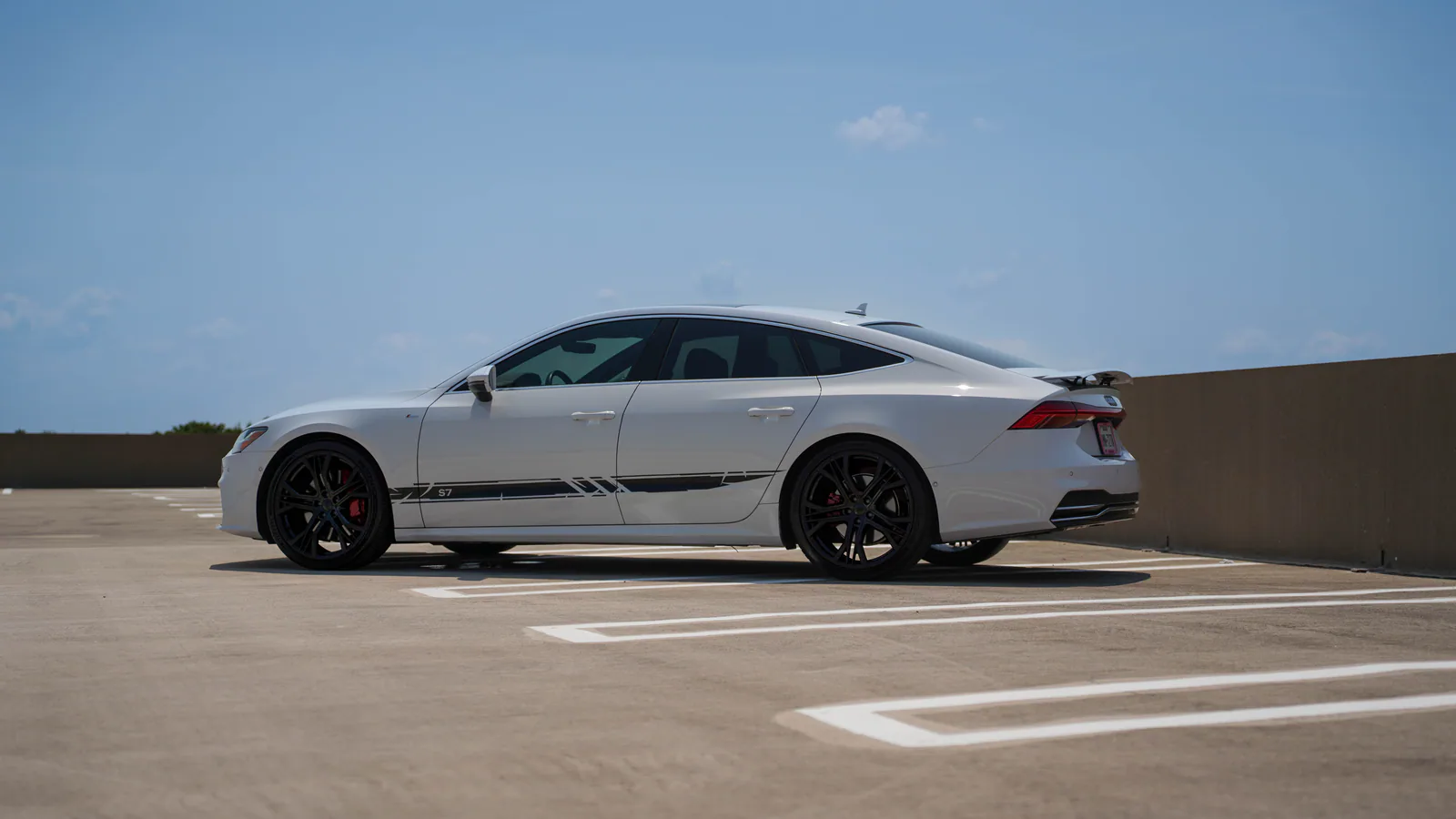 White Audi S7 sportback available for luxury rental in Dallas