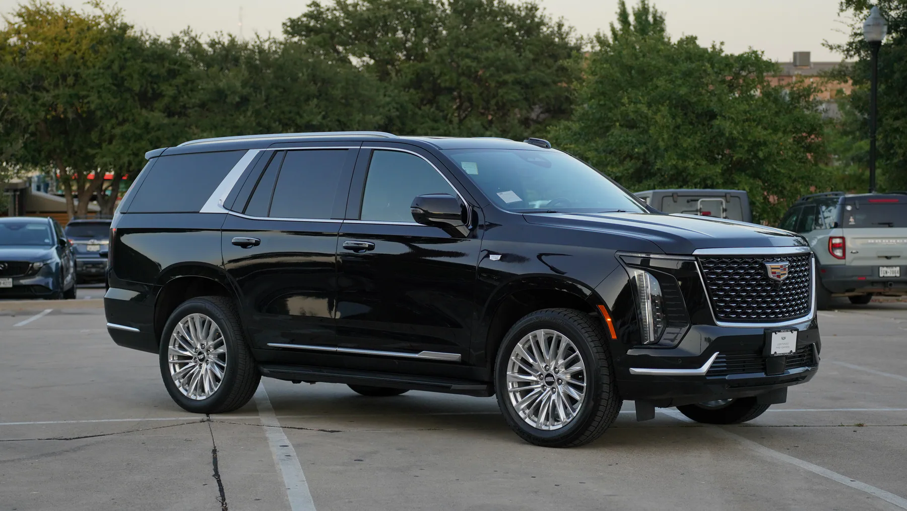 Front angle of the black 2025 Cadillac Escalade in Dallas