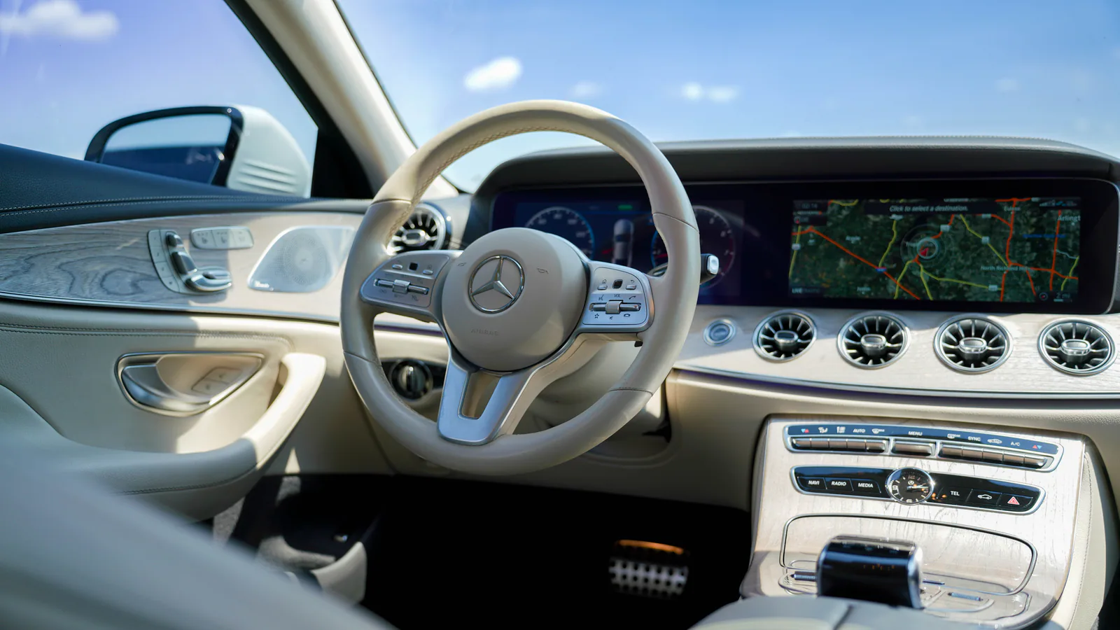Cream Mercedes CLS 450 luxury interior and digital cockpit